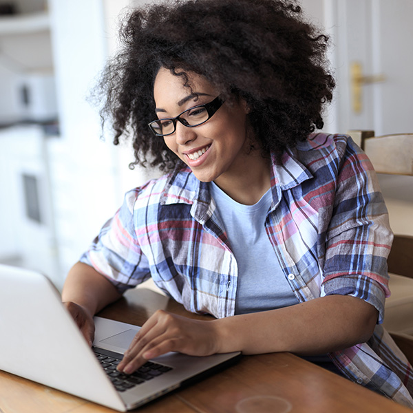 Woman using her laptop.