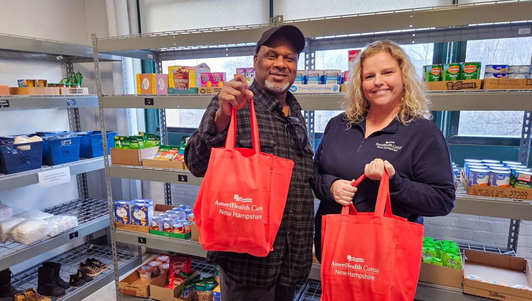 woman with daughter at the food bank.