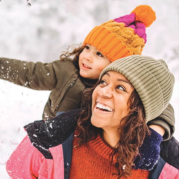 mother with child in the snow